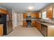 Well-lit kitchen features modern stainless-steel appliances and spacious countertop space at 260 Redding Rdg, Atlanta, GA 30349