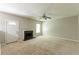 Cozy living room with fireplace and neutral carpeting throughout at 260 Redding Rdg, Atlanta, GA 30349