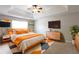 Spacious bedroom featuring tray ceilings, modern decor, and ample natural light at 260 Redding Rdg, Atlanta, GA 30349