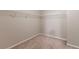 A walk-in closet is shown with metal shelving and carpeted floors at 260 Redding Rdg, Atlanta, GA 30349