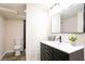 Modern bathroom featuring a stylish vanity and fixtures, and a bright mirror at 300 Saddle Creek Ln, Roswell, GA 30076