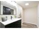 Bathroom featuring a stylish vanity, modern fixtures and art at 300 Saddle Creek Ln, Roswell, GA 30076