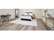 Cozy bedroom with sleek desk, white rug and decor at 300 Saddle Creek Ln, Roswell, GA 30076