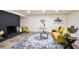 Comfortable living room featuring a stylish black brick fireplace and decorative rug at 300 Saddle Creek Ln, Roswell, GA 30076