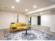 Spacious living room with stylish seating and black and white rug at 300 Saddle Creek Ln, Roswell, GA 30076