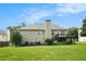 Spacious backyard featuring lush green grass and a wooden deck, perfect for outdoor entertaining at 4077 High Country Dr, Douglasville, GA 30135