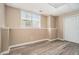 Unfinished basement area with carpet flooring and a window at 4077 High Country Dr, Douglasville, GA 30135