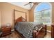 A bedroom features a bed, wood flooring, and natural light at 4077 High Country Dr, Douglasville, GA 30135