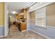 Traditional-style kitchen features stainless steel appliances and light wood cabinetry at 136 Pine St, Covington, GA 30014
