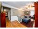 Second floor hallway features decorative railing, hardwood floors and a built-in bookcase at 1767 Tidewell Trce, Lawrenceville, GA 30043