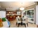 Eat-in kitchen featuring stainless steel appliances, granite countertops, and a breakfast nook at 1767 Tidewell Trce, Lawrenceville, GA 30043