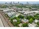 Stunning aerial view of city buildings and complexes with green spaces, showcasing a vibrant urban landscape at 32 Walthall Ne St # A, Atlanta, GA 30307
