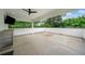 Covered outdoor patio space with mounted TV and built in bar/cabinets at 32 Walthall Ne St # A, Atlanta, GA 30307