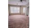 Spacious bedroom with natural light entering from two large windows and ample space at 3645 Mcclaren Way, Lawrenceville, GA 30044