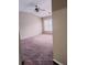 Bright bedroom with a ceiling fan and large window providing natural light at 3645 Mcclaren Way, Lawrenceville, GA 30044