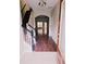 Inviting foyer with hardwood floors and staircase leading to the upper level at 3645 Mcclaren Way, Lawrenceville, GA 30044