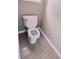 Clean half bathroom featuring a toilet and neutral wall color at 3645 Mcclaren Way, Lawrenceville, GA 30044