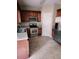 Functional kitchen features stainless steel appliances, ample counter space, and wood cabinets at 3645 Mcclaren Way, Lawrenceville, GA 30044