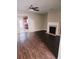 Spacious living room with hardwood floors, fireplace, and ample natural light at 3645 Mcclaren Way, Lawrenceville, GA 30044
