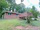 Brick home with lovely back deck and cozy outdoor space at 4103 Indian Creek Cir, Stone Mountain, GA 30083