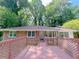 Inviting home exterior featuring a spacious, wood-lattice deck at 4103 Indian Creek Cir, Stone Mountain, GA 30083