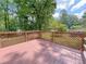 Spacious wood lattice deck offering a tranquil outdoor space at 4103 Indian Creek Cir, Stone Mountain, GA 30083