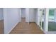 Hallway with laminate floors and freshly painted walls at 4103 Indian Creek Cir, Stone Mountain, GA 30083
