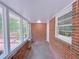 Brick sunroom with white trim windows offers bright and airy space at 4103 Indian Creek Cir, Stone Mountain, GA 30083