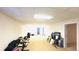 A large unfinished basement offers potential for customization, with wall-to-wall carpet and a drop ceiling at 4569 Campenille Trce, Suwanee, GA 30024