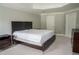Large bedroom with tray ceiling and neutral carpet at 4569 Campenille Trce, Suwanee, GA 30024