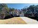 Charming two-story home with well-kept lawn, a driveway, and a two-car attached garage at 4569 Campenille Trce, Suwanee, GA 30024