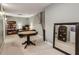 Versatile bonus room with neutral carpet, a desk and large mirror at 2177 Mauldin Nw St, Atlanta, GA 30318