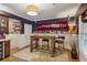 Open dining area featuring a custom bar and a window with blinds at 2177 Mauldin Nw St, Atlanta, GA 30318