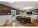 Inviting living room featuring a wood accent wall and backyard access at 2177 Mauldin Nw St, Atlanta, GA 30318