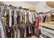 Organized walk-in closet with shelving and hanging space, perfect for storage at 2177 Mauldin Nw St, Atlanta, GA 30318