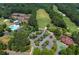 Aerial view of the community amenities including a pool, tennis courts and a golf course at 3511 Stone Cliff Way, Woodstock, GA 30189