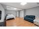 This living room features a bed and a sofa at 3511 Stone Cliff Way, Woodstock, GA 30189