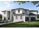 Beautiful two-story home featuring a combination of brick and vinyl siding, a manicured lawn, and a three car garage at 3769 High Green Dr, Marietta, GA 30068