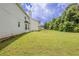 A spacious backyard with a well-maintained lawn at 4185 Post Oak Grv, Atlanta, GA 30349