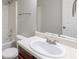 A bathroom featuring a combination shower and tub, toilet, and a vanity with a single sink at 4185 Post Oak Grv, Atlanta, GA 30349