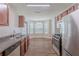 Practical kitchen with stainless steel appliances, and generous cabinet space, ready for home cooking at 4185 Post Oak Grv, Atlanta, GA 30349