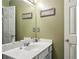 Bathroom featuring vanity with sink, white countertops and neutral wall color at 912 Spring Vly, Woodstock, GA 30189