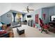 Comfortable bedroom with ceiling fan, TV, and plenty of natural light at 912 Spring Vly, Woodstock, GA 30189