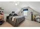 Bedroom with unique decor, ceiling fan, and window at 912 Spring Vly, Woodstock, GA 30189