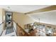 Open-concept living room with fireplace, hardwood floors, and lots of natural light at 912 Spring Vly, Woodstock, GA 30189