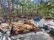 Aerial view of a community playground surrounded by trees and a fence at 912 Spring Vly, Woodstock, GA 30189