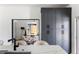 An open floorplan features gray cabinets and modern design elements looking into a cozy office space at 941 Garibaldi Sw St, Atlanta, GA 30310