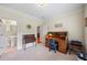 Versatile home office with neutral carpet, classic desk, and ample natural light at 1524 Guthrie Crossing Dr, Loganville, GA 30052