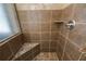 Detailed view of the shower featuring stylish tile surround at 1524 Guthrie Crossing Dr, Loganville, GA 30052