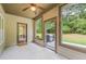Bright sunroom featuring multiple windows and an access door to the serene backyard at 1524 Guthrie Crossing Dr, Loganville, GA 30052